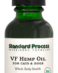 Image of a bottle of liquid VF Hemp Oil from Standard Process Veterinary Formulas next to a dropper that is included with the bottle.